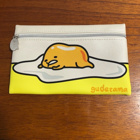 ipsy Handbags - ipsy gudetama bag